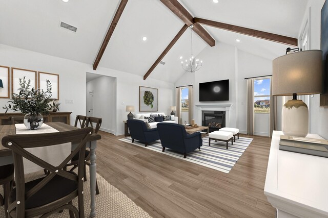 dining room with hardwood / wood-style floors, a notable chandelier, beamed ceiling, and high vaulted ceiling