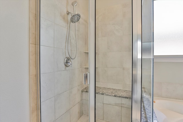 bathroom with independent shower and bath