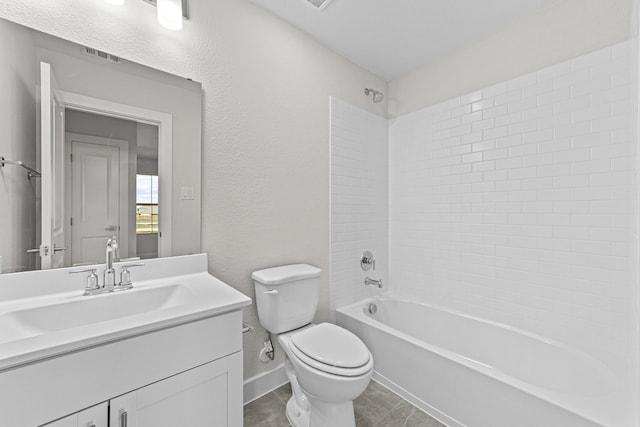 bathroom with baseboards, visible vents, toilet, vanity, and shower / bathing tub combination