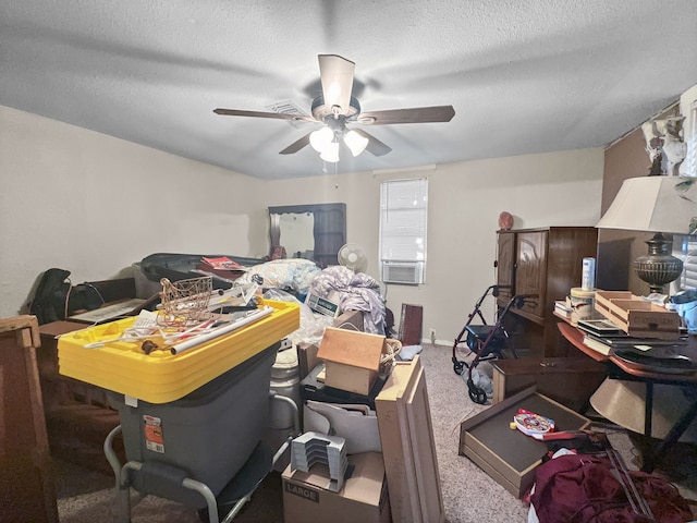 office area featuring ceiling fan, a textured ceiling, and carpet flooring