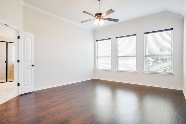 empty room with ceiling fan, vaulted ceiling, crown molding, and dark wood-type flooring