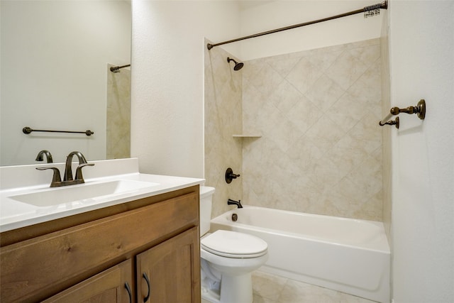 full bathroom with tiled shower / bath combo, tile patterned floors, vanity, and toilet