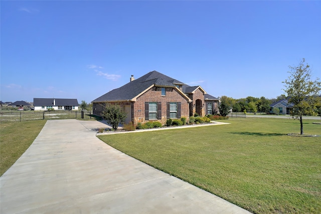 craftsman-style house with a front yard