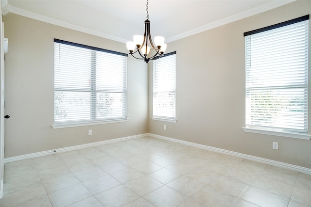 tiled spare room featuring ornamental molding, a wealth of natural light, and an inviting chandelier