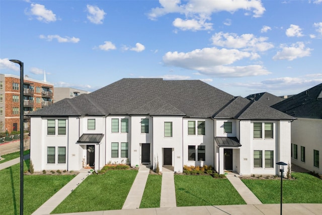 view of property with a front lawn