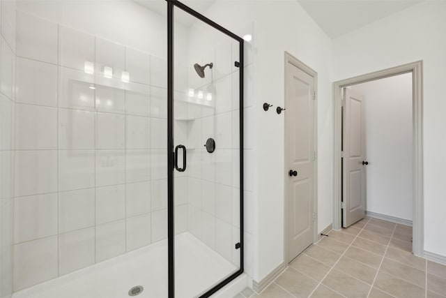 bathroom featuring tile patterned floors and walk in shower