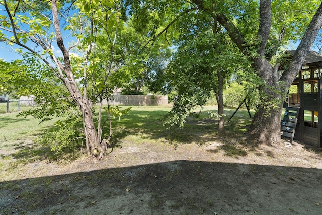 view of yard with fence