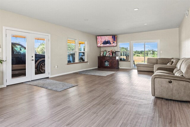 dining area featuring visible vents, baseboards, a tray ceiling, recessed lighting, and dark wood-style floors