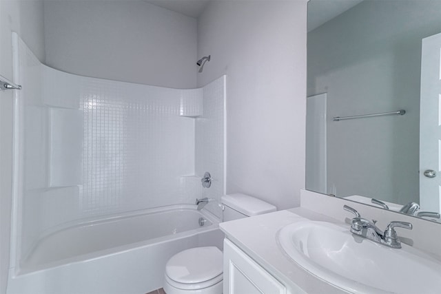 full bathroom featuring toilet, vanity, and bathtub / shower combination