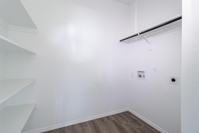 laundry room with hookup for a washing machine, gas dryer hookup, laundry area, dark wood-style flooring, and electric dryer hookup