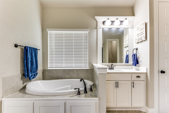 bathroom featuring a bathing tub and vanity