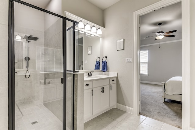 bathroom featuring ornamental molding, an enclosed shower, tile patterned flooring, vanity, and ceiling fan