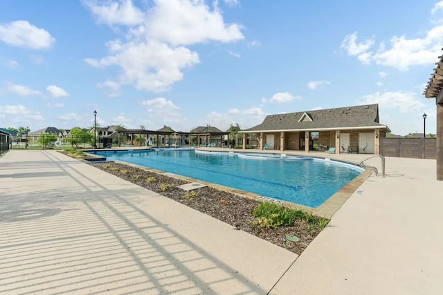 view of pool featuring a patio area