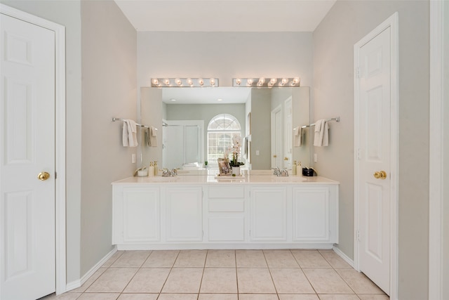 bathroom with vanity and tile patterned floors