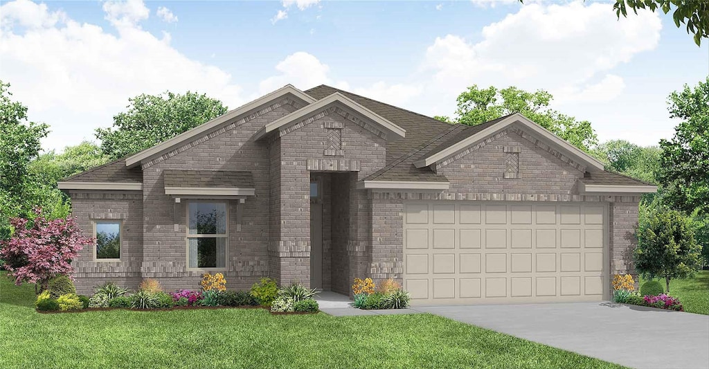 view of front of property featuring a front yard and a garage