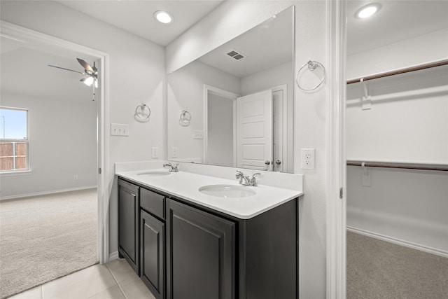 bathroom with vanity, tile patterned floors, and ceiling fan