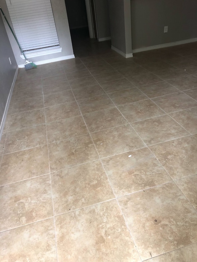 interior details featuring tile patterned floors