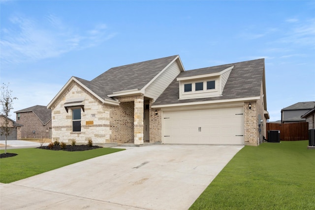 3476 N Crowley Cleburne Rd, Fort Worth, TX 76123 - view of front of home featuring a garage, central AC, and a front yard