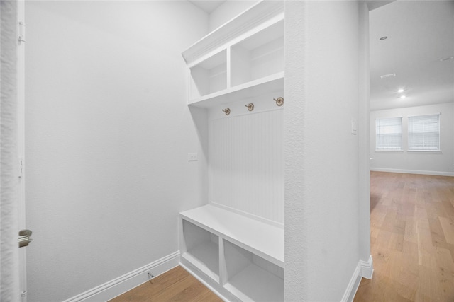 mudroom featuring wood-type flooring