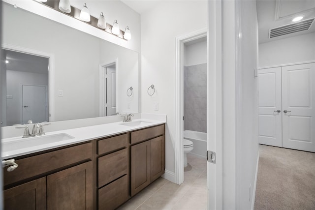 full bathroom featuring vanity, tile patterned flooring,  shower combination, and toilet