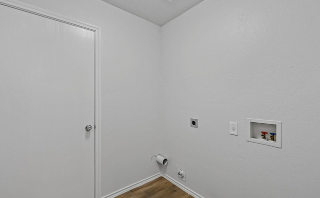 laundry room featuring hookup for a gas dryer, hardwood / wood-style floors, hookup for a washing machine, and hookup for an electric dryer