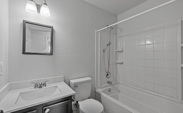 full bath with shower / bathtub combination, toilet, vanity, and a textured wall