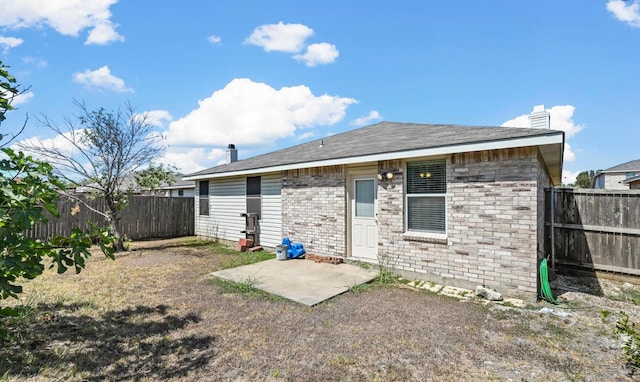 rear view of house with a patio area