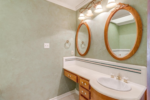 bathroom with vanity and crown molding