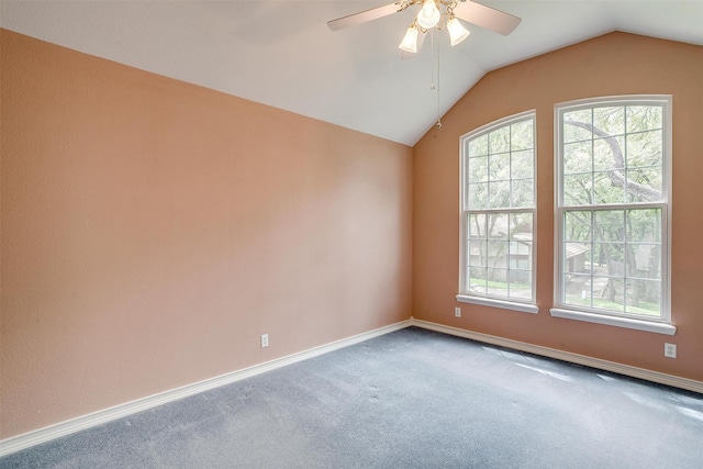 interior space featuring ceiling fan and lofted ceiling