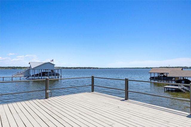 view of dock with a water view