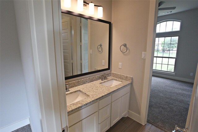 168 Falcon Point Dr, Heath, TX 75032 - bathroom featuring vanity, hardwood / wood-style flooring, and ceiling fan