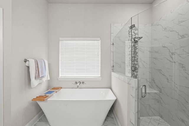 bathroom featuring tile patterned floors and independent shower and bath