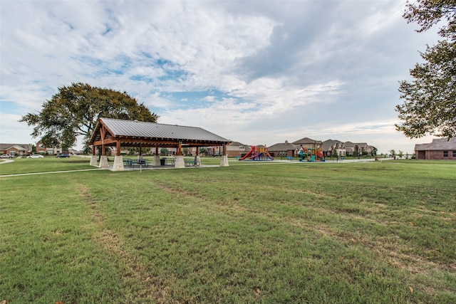 view of yard with a gazebo and a playground