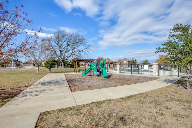 view of jungle gym with a yard