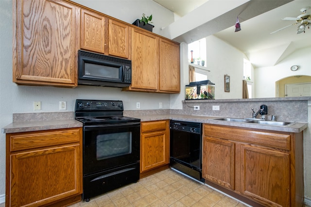 kitchen with ceiling fan, vaulted ceiling, light tile patterned floors, sink, and black appliances