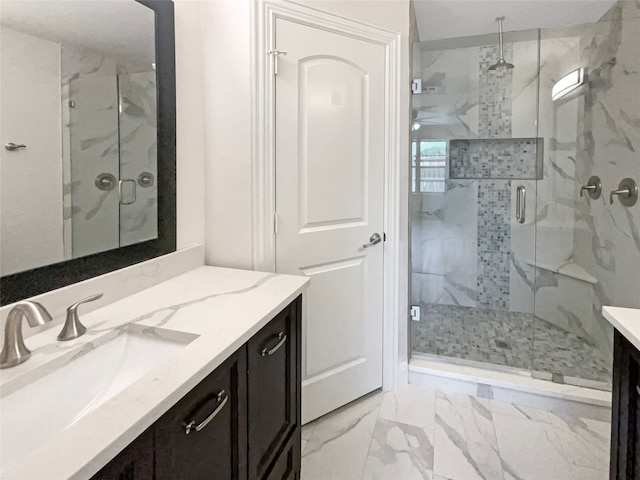 bathroom featuring tile patterned floors, walk in shower, and vanity