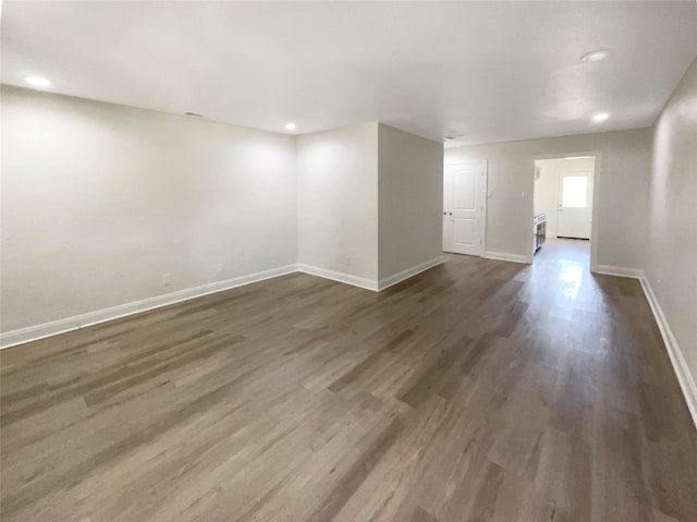 spare room featuring hardwood / wood-style floors