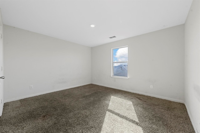 spare room with carpet flooring