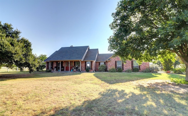 view of front facade with a front yard