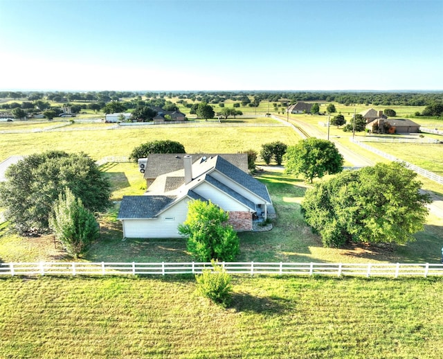 birds eye view of property featuring a rural view