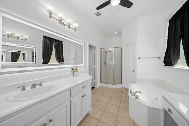 bathroom featuring plus walk in shower, tile patterned floors, crown molding, vanity, and ceiling fan