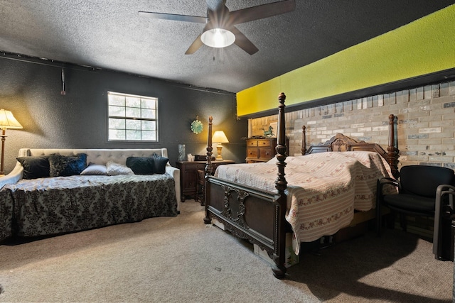 carpeted bedroom featuring a ceiling fan, a wood stove, a textured wall, and a textured ceiling