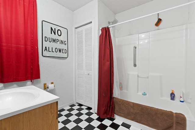 full bath with shower / bathtub combination with curtain, vanity, and tile patterned floors