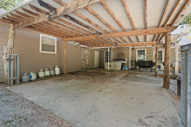 view of patio featuring an attached carport