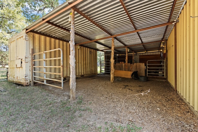 view of horse barn featuring an outdoor structure