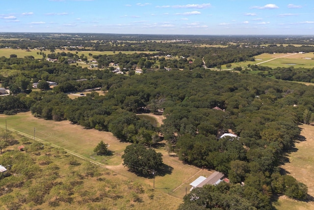 drone / aerial view with a rural view and a forest view