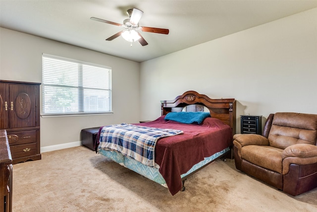 bedroom featuring carpet floors, ceiling fan, and baseboards