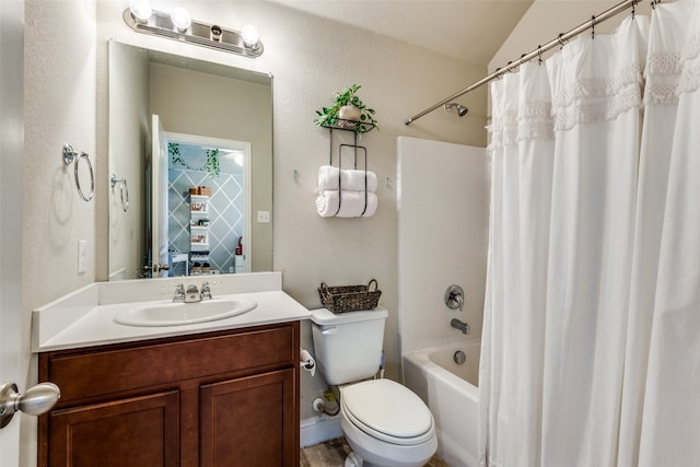 full bathroom with vanity, toilet, shower / bathtub combination with curtain, and vaulted ceiling