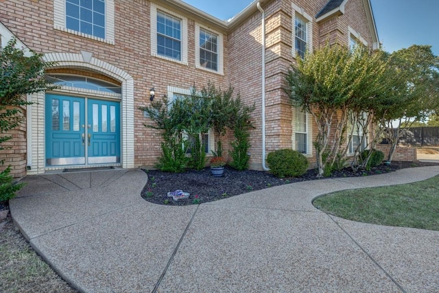 entrance to property featuring french doors