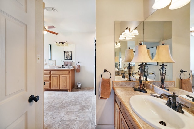 bathroom with vanity, tile patterned floors, and ceiling fan